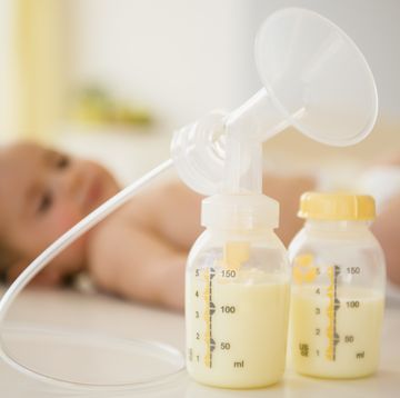breast pump next to baby