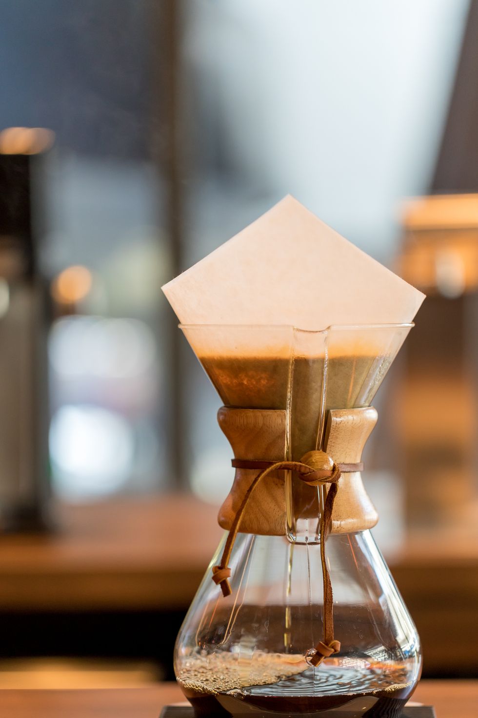https://hips.hearstapps.com/hmg-prod/images/brewing-third-wave-coffee-with-chemex-glass-in-the-royalty-free-image-1608298373.?crop=0.872xw:0.873xh;0.128xw,0.127xh&resize=980:*