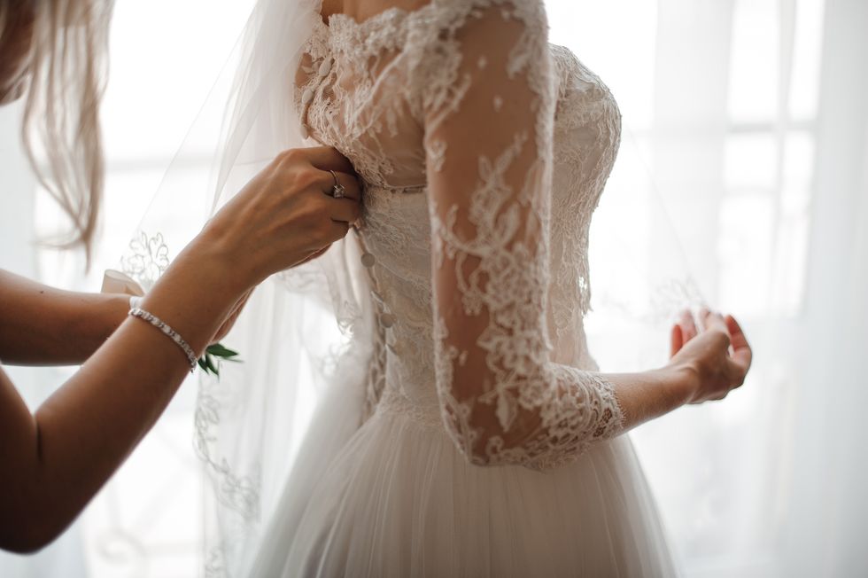 Bridesmaid  brides wedding dress