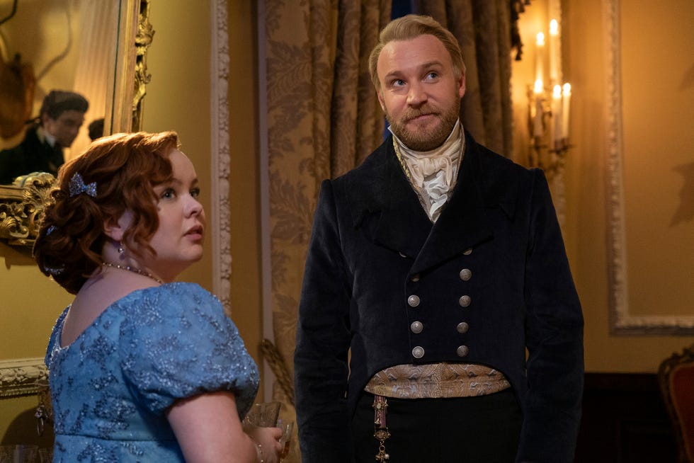 a man and woman in formal wear