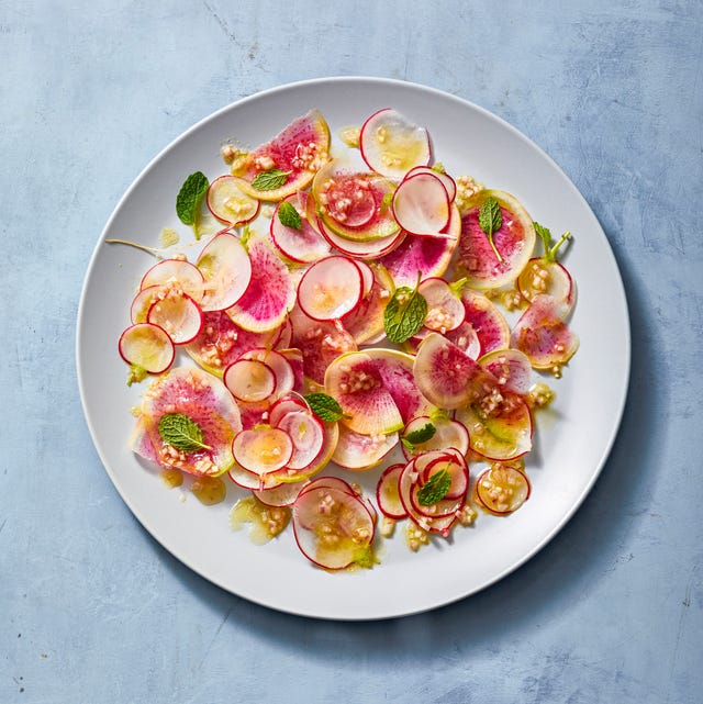 bright radish salad on a white plate bright radish salad on a white plate