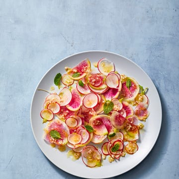 bright radish salad on a white plate bright radish salad on a white plate