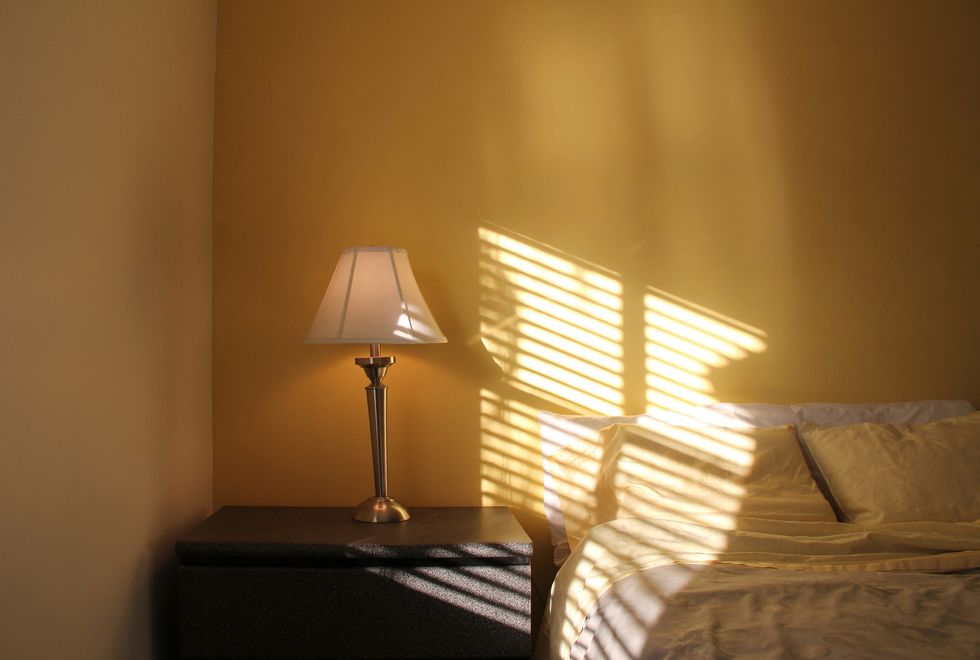 bright sun shining through window in bedroom