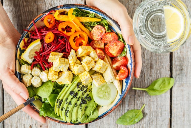 Bright vegetable buddha bowl with tofu.