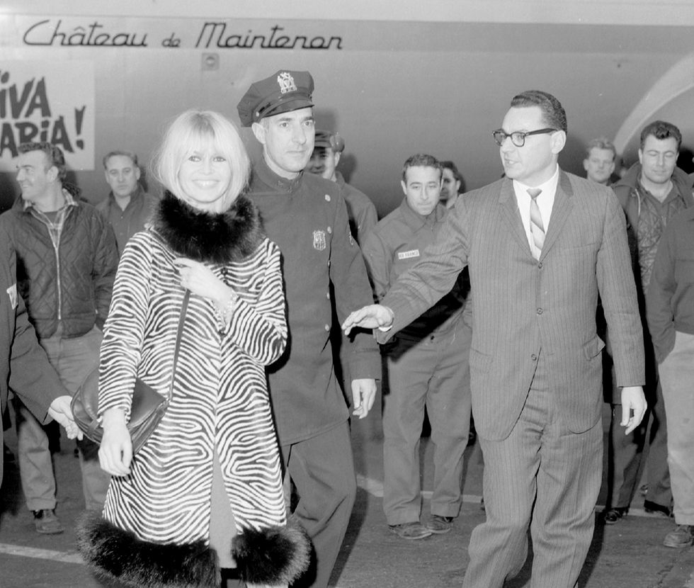 brigitte bardot arrives at kennedy airport looking chic in a