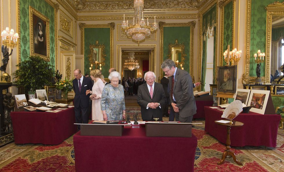 Queen Elizabeth II welcomes Irish President Michael D Higgins to the Green Drawing Room (April 8, 2014 )