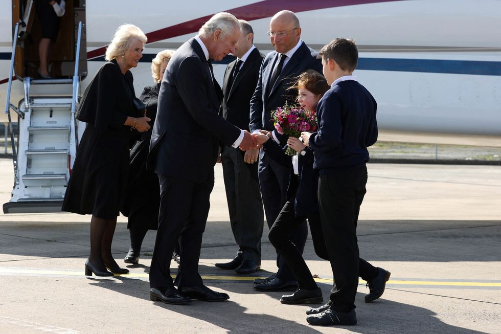 charles and camilla are welcomed to belfast