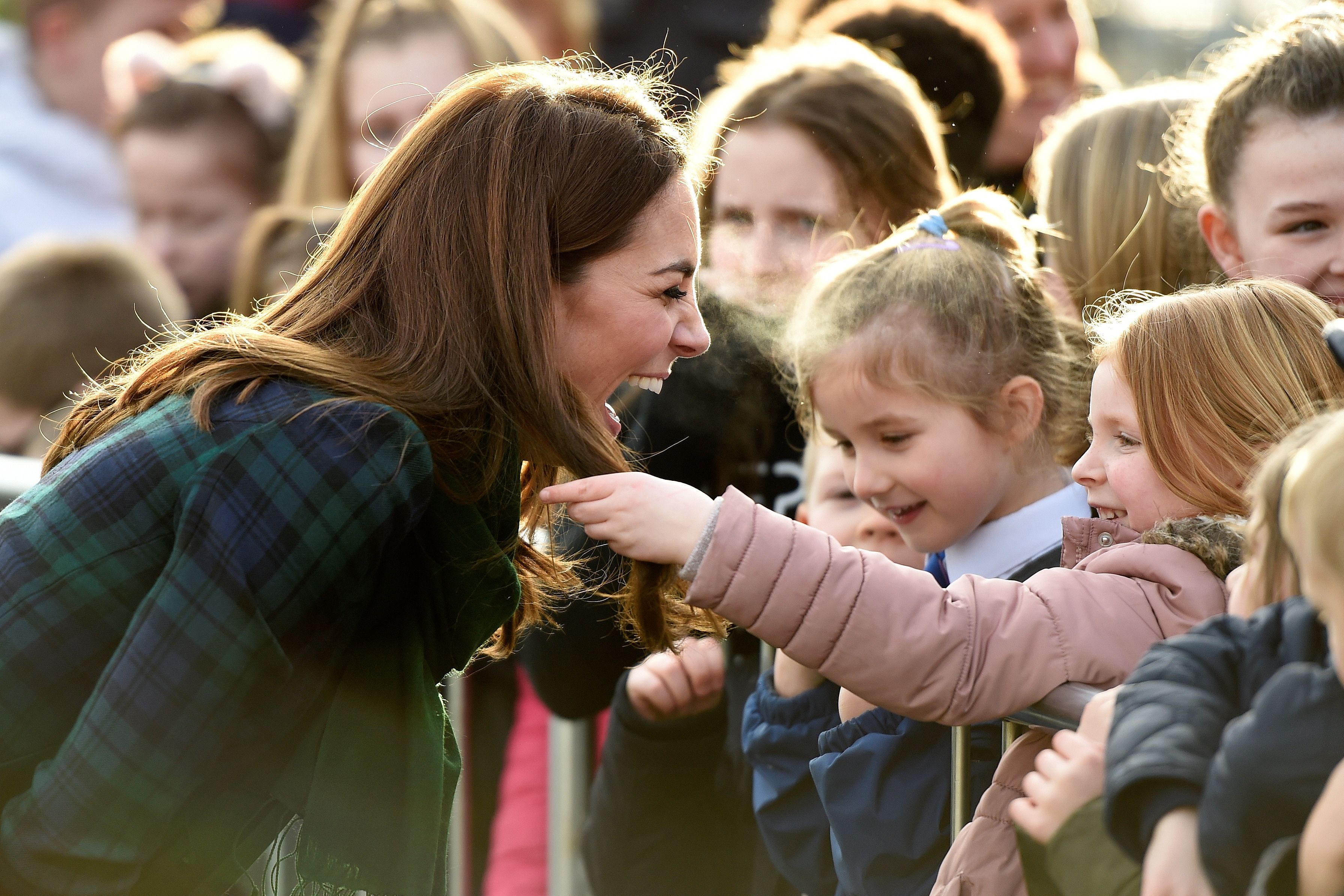 britains-catherine-duchess-of-cambridge-reacts-as-a-young-news-photo-1090893680-1548795085.jpg