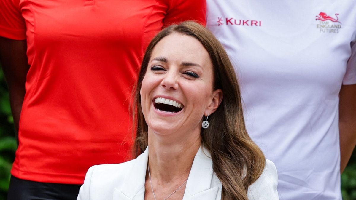 Duchess of Cambridge Kate Middleton wears white suit by Alexander McQueen