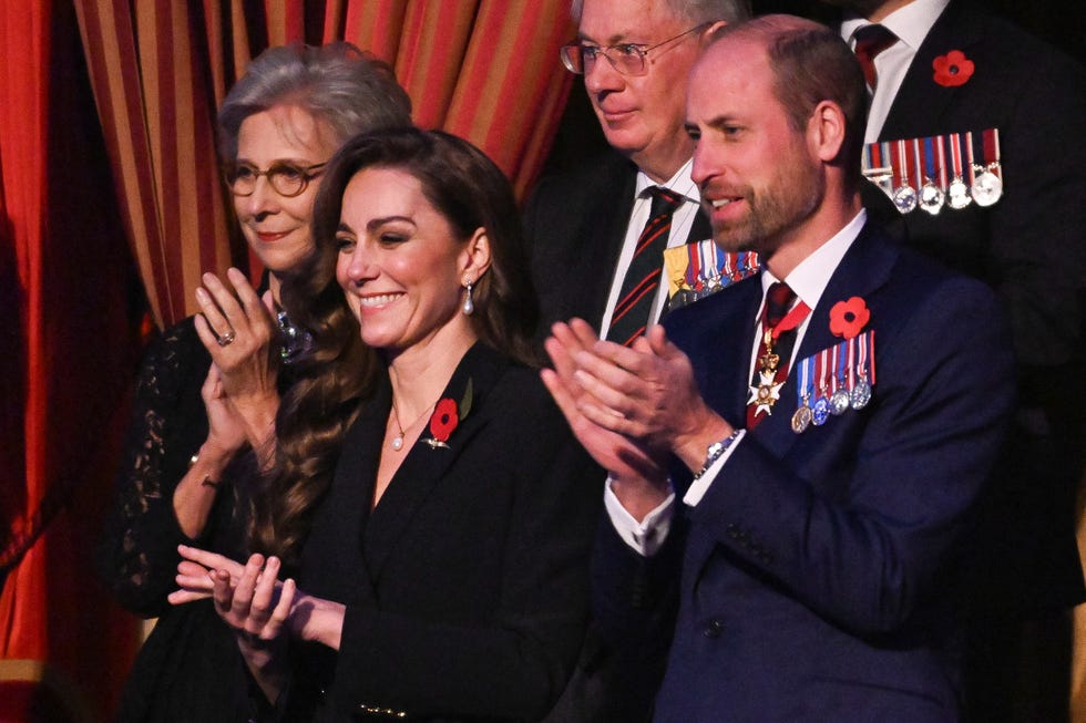 the king and members of the royal family attend festival of remembrance