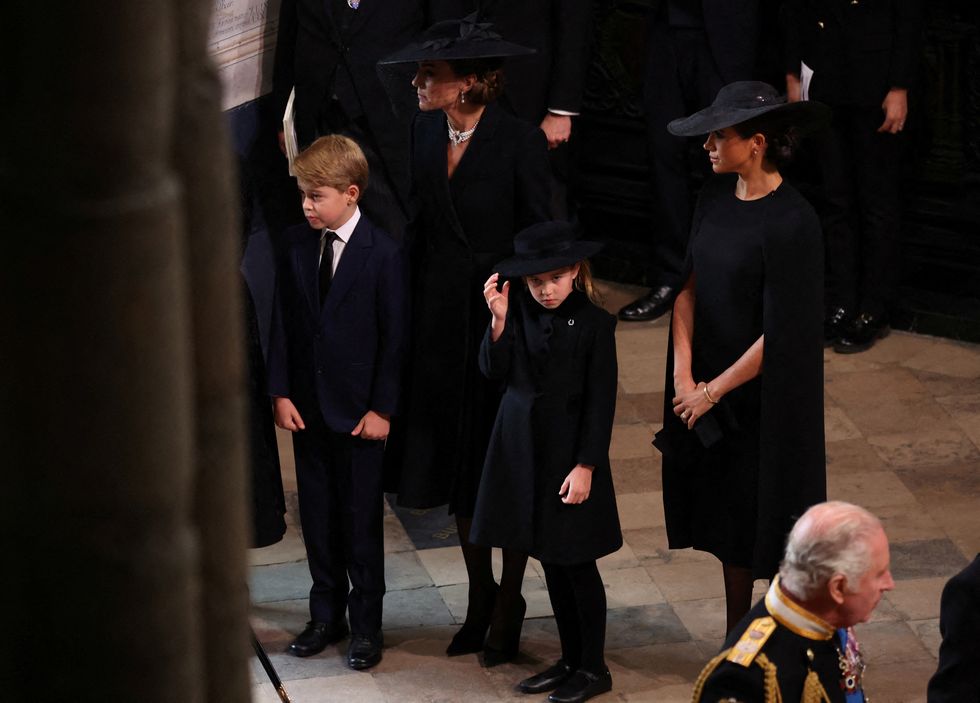 kate with meghan at the state funeral of queen elizabeth ii