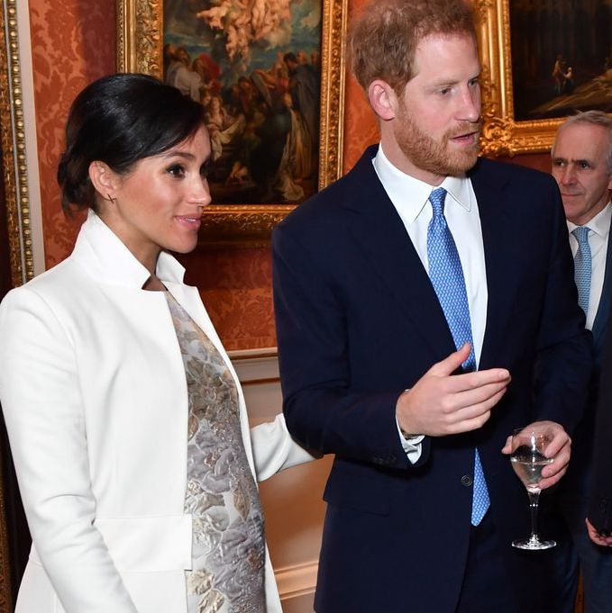 Meghan Markle Wears White Coat & Brocade Dress to Prince Charles Reception