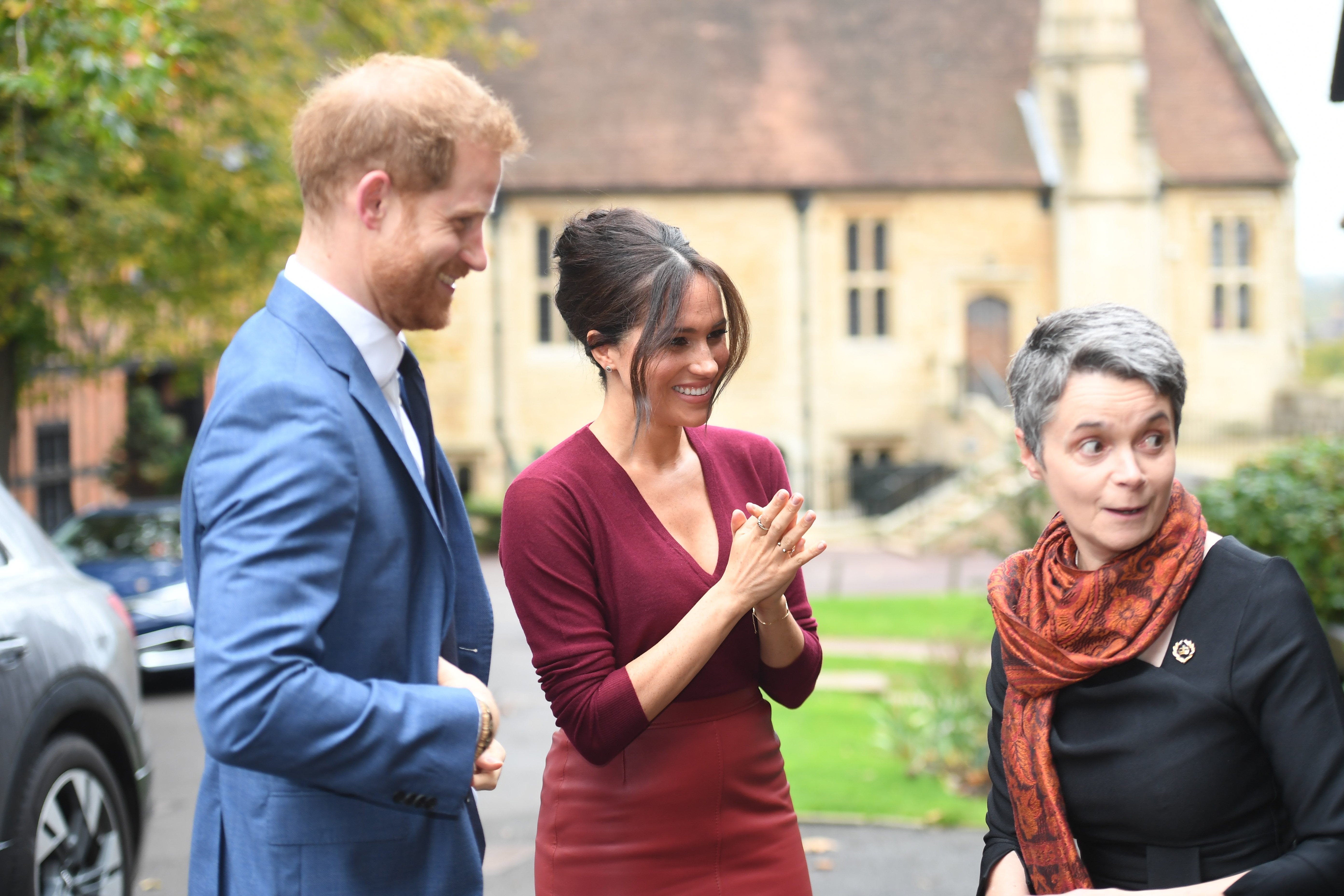 Meghan Markle Wears Red Lambskin Skirt to One Young World Discussion