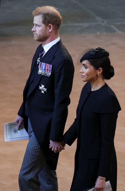 Meghan and Harry holding hands after the ceremony meghan and harry holding hands after the ceremony