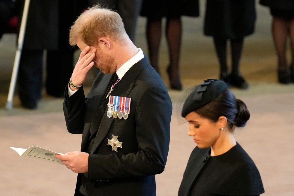 prince harry wiping away tear