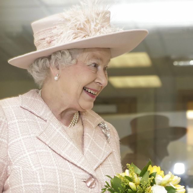 Britain's Queen Elizabeth II holds a bun