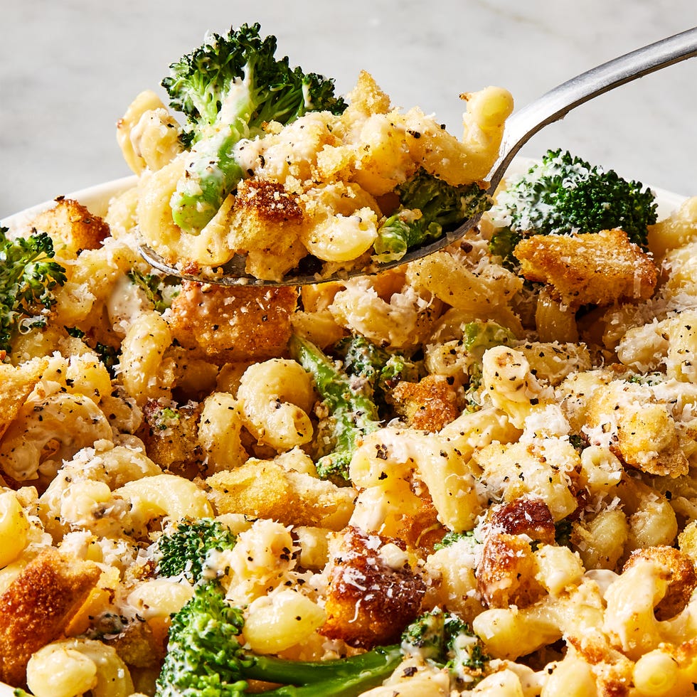 broccoli caesar pasta salad topped with crunchy croutons