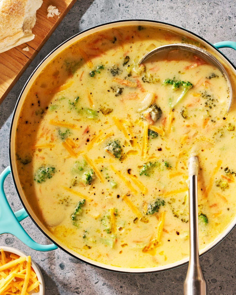 broccoli cheddar soup sprinkled with cheddar cheese