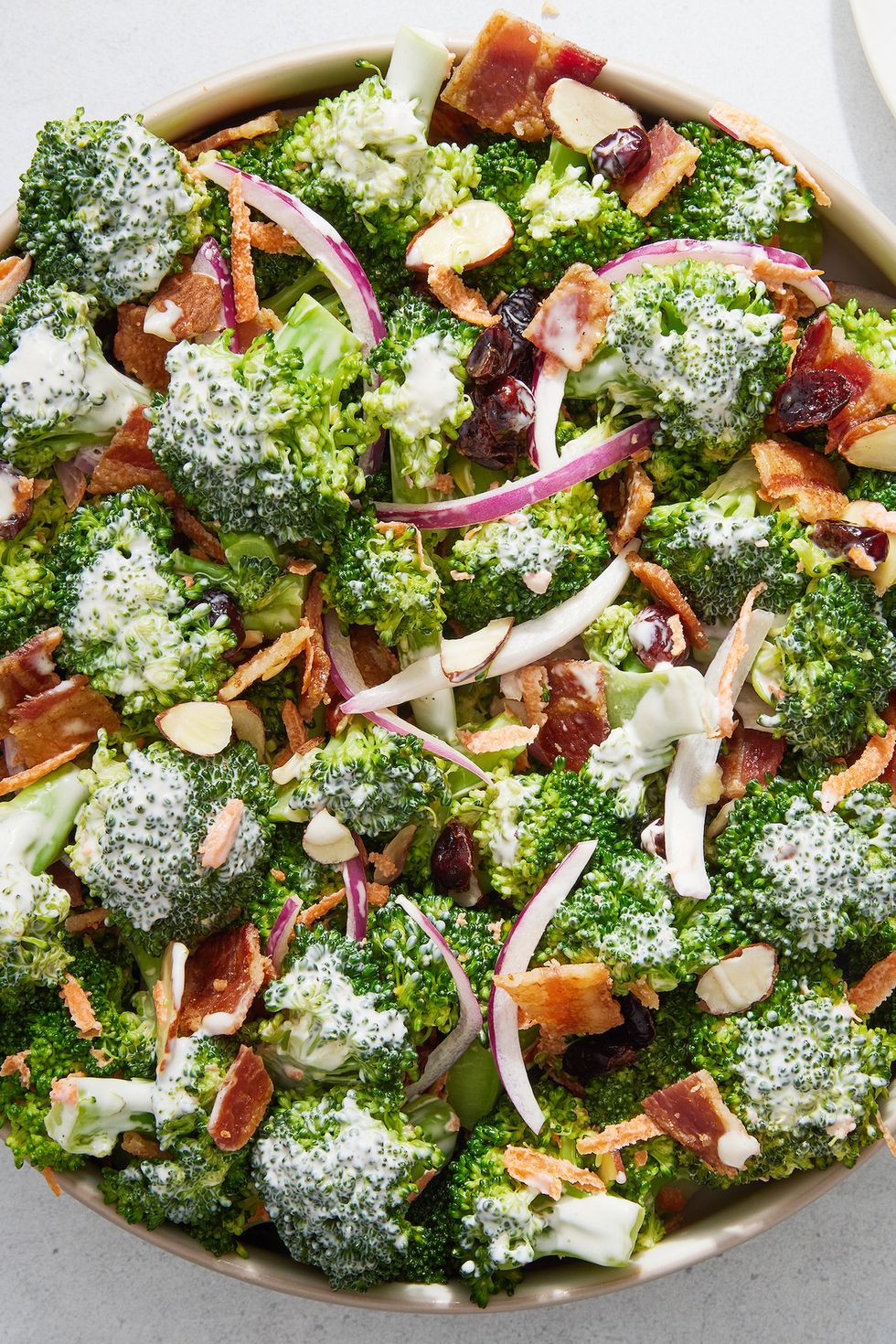 broccoli salad with bacon, red onion, and almonds