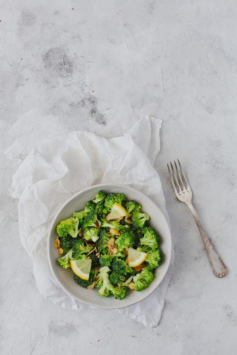 broccoli salad on rustic white background with copy space