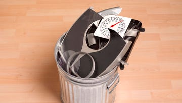 broken bathroom scales in dustbin