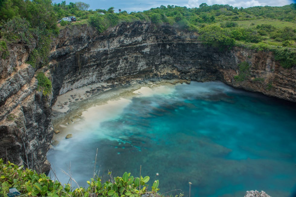 broken beach arch in nusa penida, bali