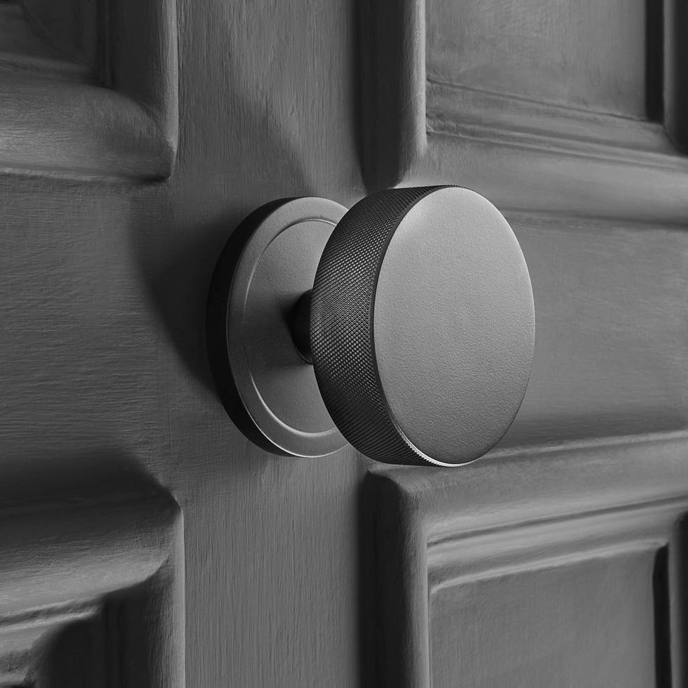 a silver front door knob