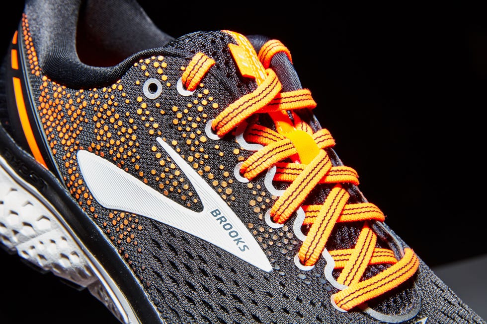 Footwear, Running shoe, Shoe, Orange, Sneakers, Yellow, Athletic shoe, Tennis shoe, Walking shoe, Outdoor shoe, 