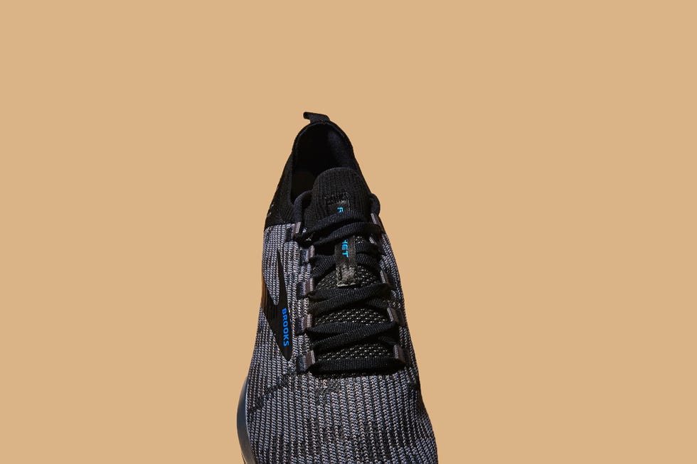 Footwear, Black, Shoe, Beige, Hobo bag, Leather, Font, Sneakers, Fashion accessory, 