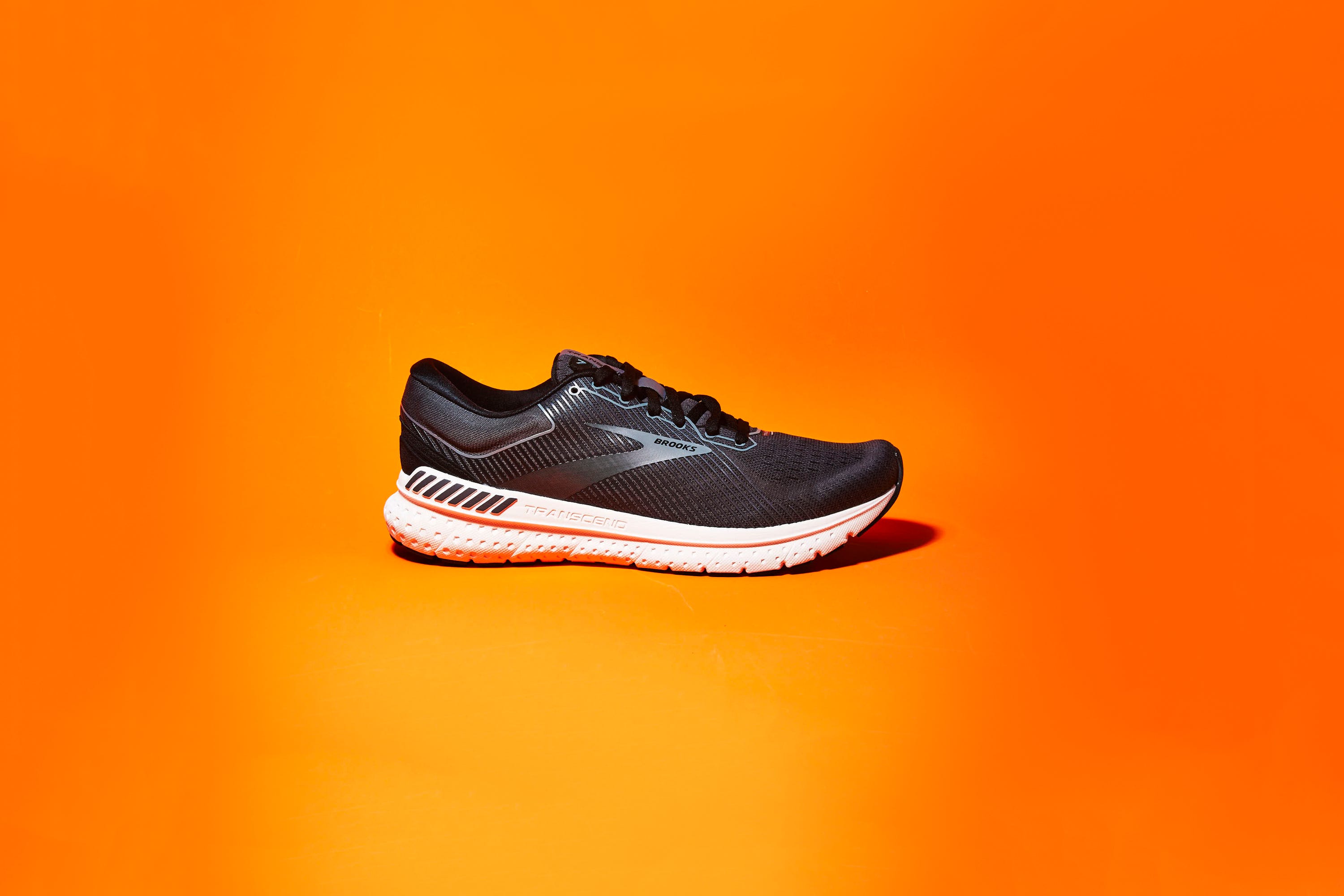Shoe, Footwear, Running shoe, Orange, Walking shoe, White, Sportswear, Outdoor shoe, Cross training shoe, Yellow, 