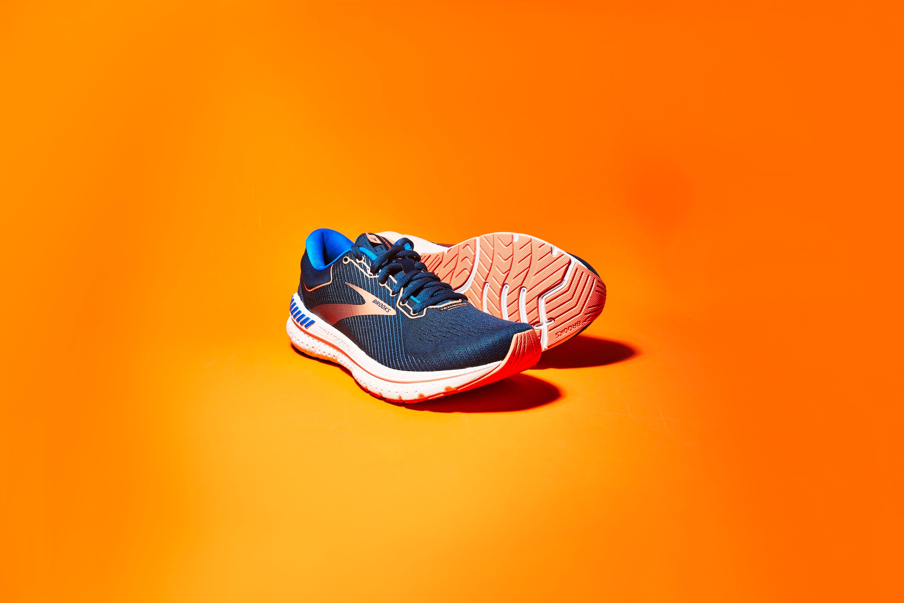 Orange, Footwear, Shoe, Outdoor shoe, Athletic shoe, Macro photography, Stock photography, Electric blue, Photography, Sneakers, 