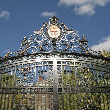 a gate with a clock on it