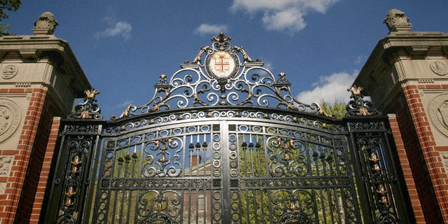 a gate with a clock on it