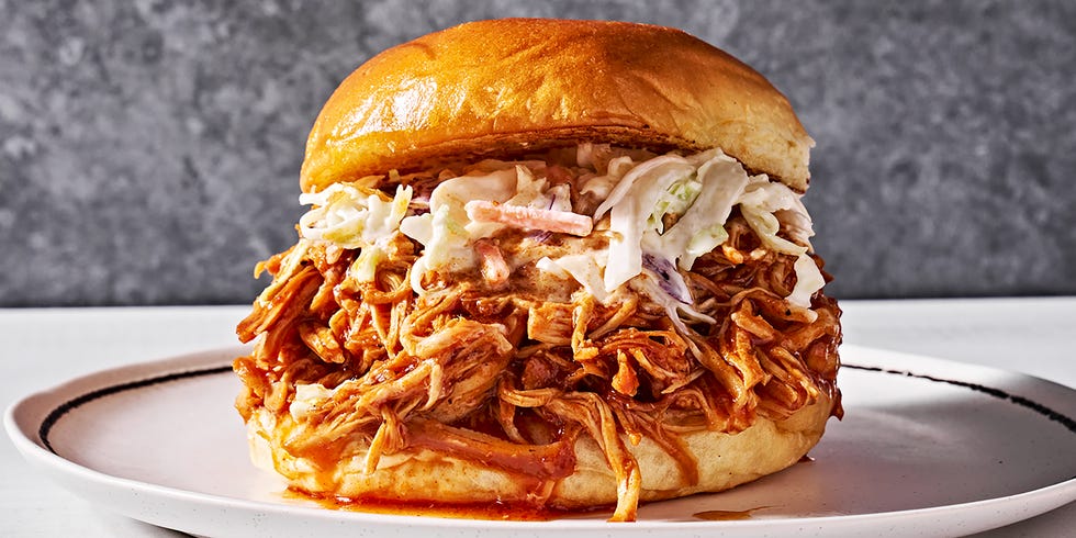 brown sugar bbq chicken in a sandwich with slaw