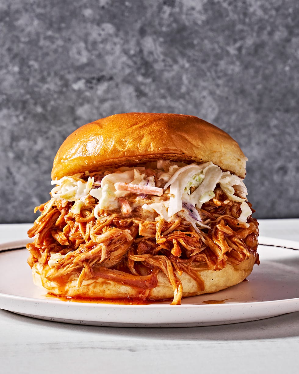 brown sugar bbq chicken in a sandwich with slaw