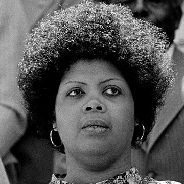 Linda Brown Smith, left, of Topeka, Kansas, listens to Benjamin L. Hooks, executive director of the NAACP, during ceremonies observing the 25th anniversay of the U.S. Supreme Court's desegregation ruling in the Brown v. Board of Education of Topeka in Columbus, S.C., May 1979.   It was Brown's father who initiated the class-action suit in  the Brown v. Board of Education of Topeka, Kans., which led to the U.S. Supreme Court's 1954 landmark decision against school segregation.  (AP Photo)