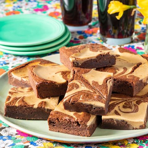 guiness brownies swirled with beer in glass in back
