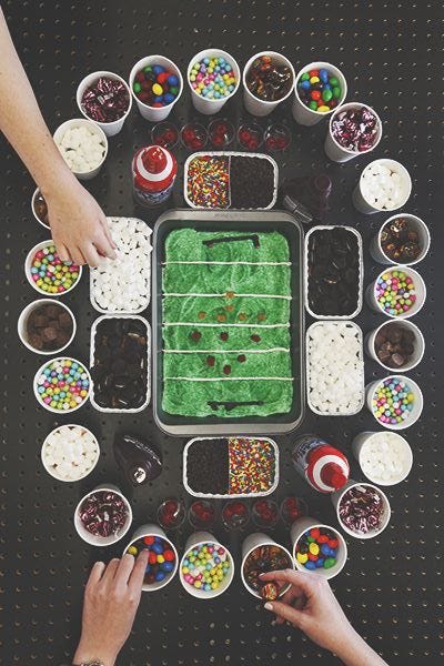 a group of people making food