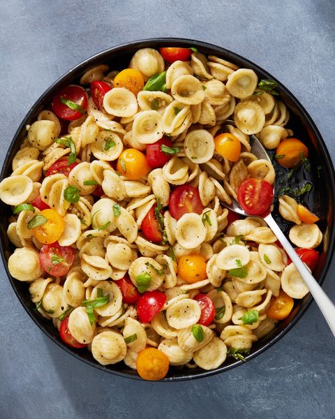 bruschetta pasta salad with fresh cherry tomatoes and basil
