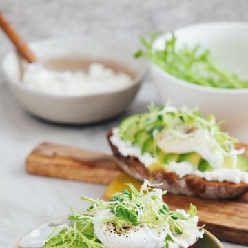 Bruschetta with avocado, ricotta and poached egg