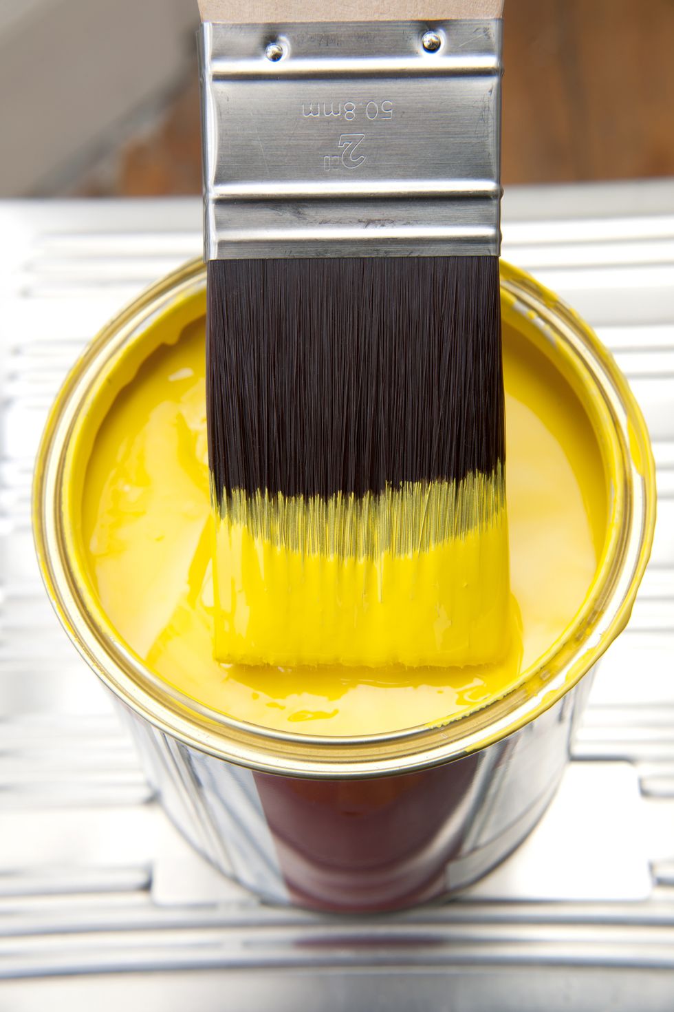Brush and yellow paint