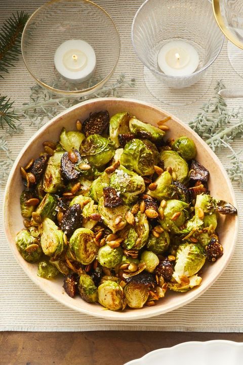 brussels sprouts with pepitas and figs in a bowl