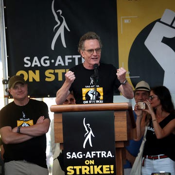 actor bryan cranston speaks next to steve buscemi, brendan fraser, f murray abraham and jill hennessy at a sag aftra strike rally in times square, in manhattan in new york city, new york, us, july 25, 2023