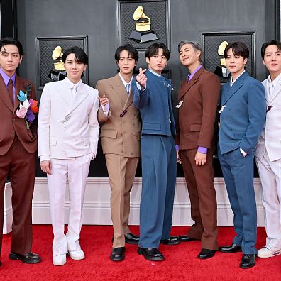 las vegas, nevada   april 03 l r v, suga, jin, jungkook, rm, jimin and j hope of bts attends the 64th annual grammy awards at mgm grand garden arena on april 03, 2022 in las vegas, nevada photo by axellebauer griffinfilmmagic