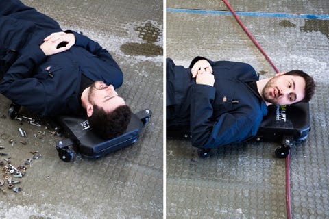 testing mechanic creepers on garage floor