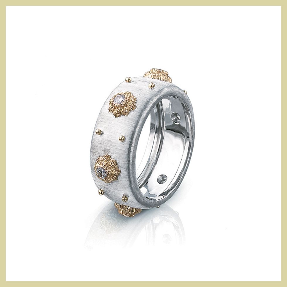 a silver and gold ring