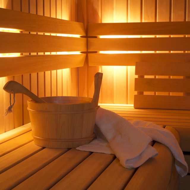bucket and towels in sauna