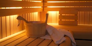 bucket and towels in sauna