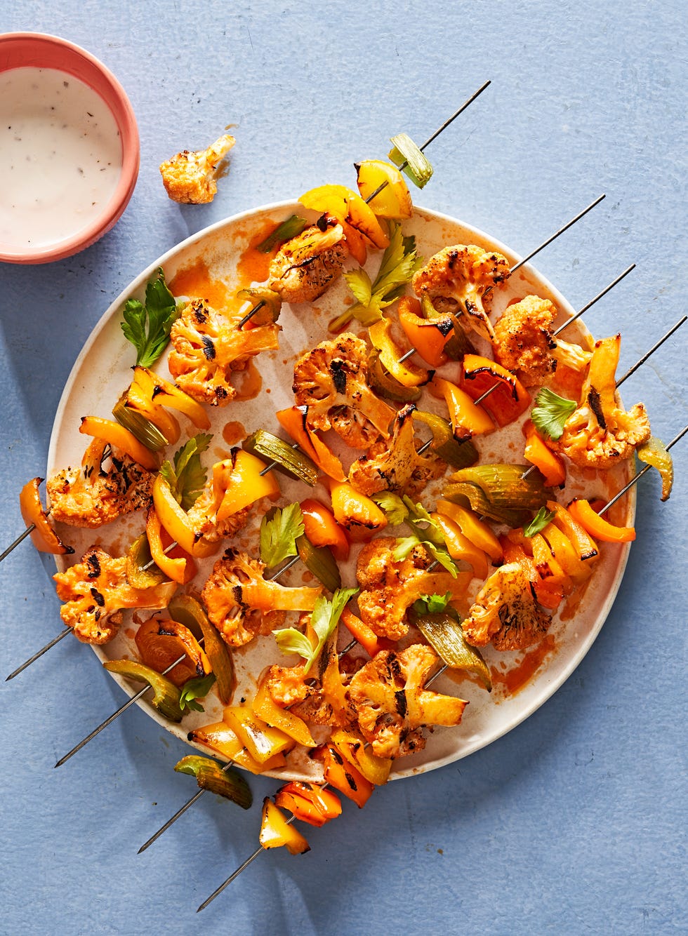 buffalo cauliflower kebabs with peppers and celery