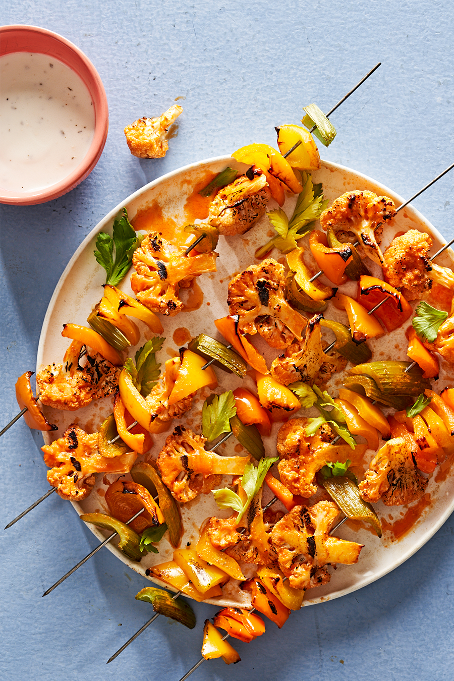 buffalo cauliflower kebabs with peppers and celery